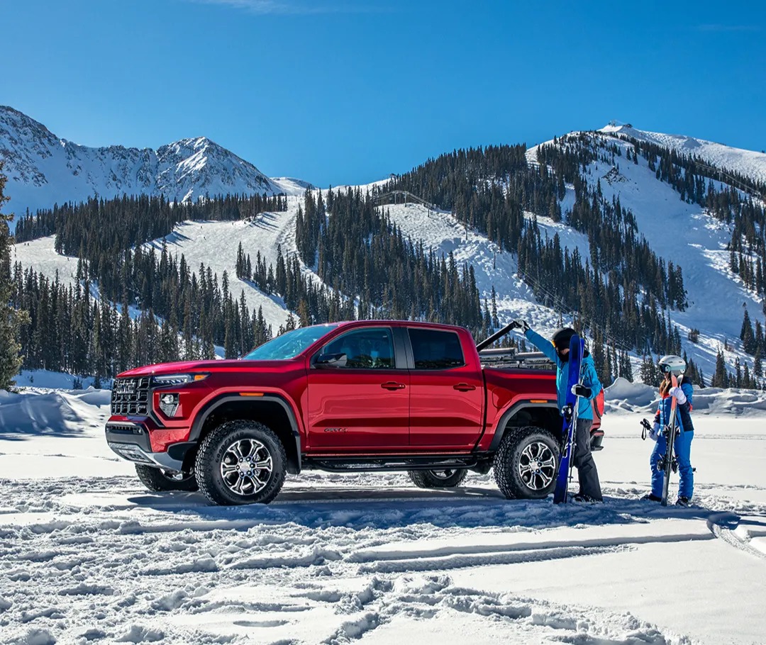 2025 GMC Canyon parked on snow mountain