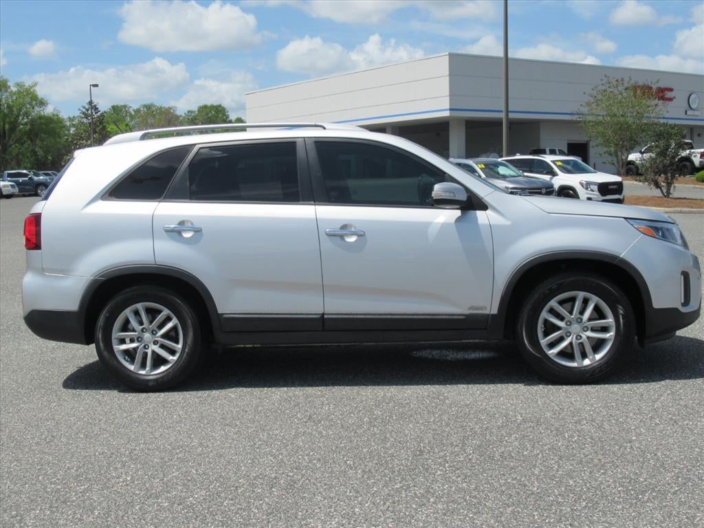 Used 2014 Kia Sorento LX with VIN 5XYKTCA65EG450863 for sale in Fruitland Park, FL