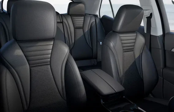 Black perforated leatherette front and rear seats inside the Buick Envision Preferred