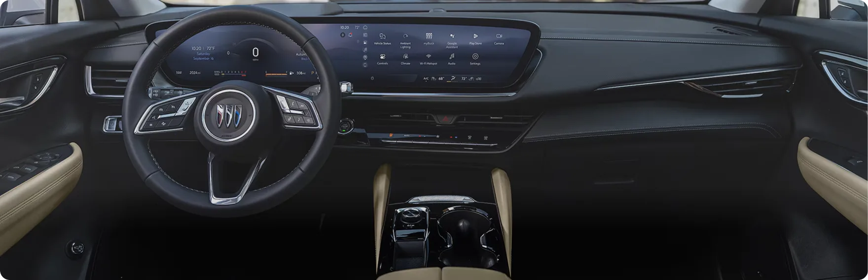 Buick Envision Preferred dashboard with the steering wheel and ultrawide display above a cream interior