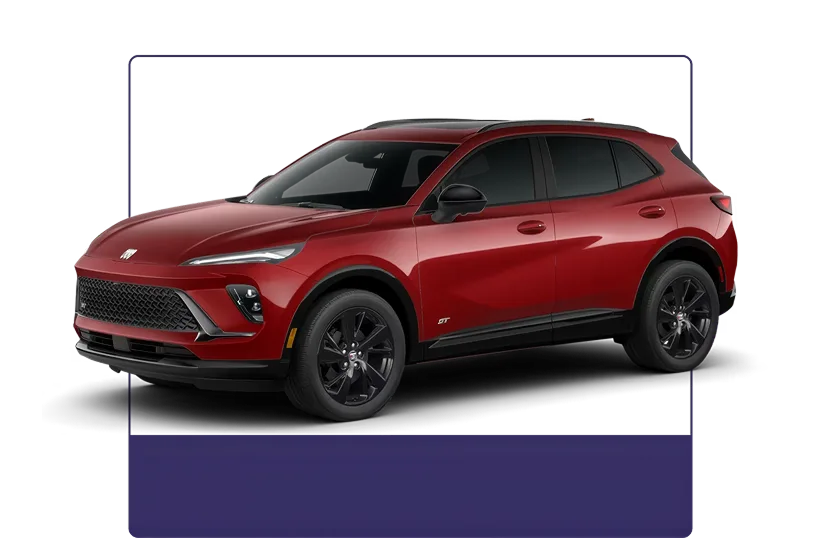 Red Buick Envision Sport Touring shown from the front three-quarter angle on a dark studio background