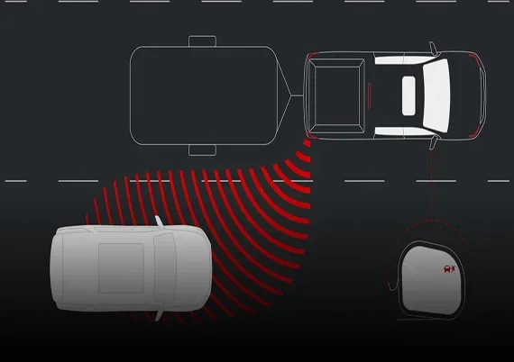 Overhead illustration of a Canyon towing a trailer with red arcs marking a vehicle in its blind zone