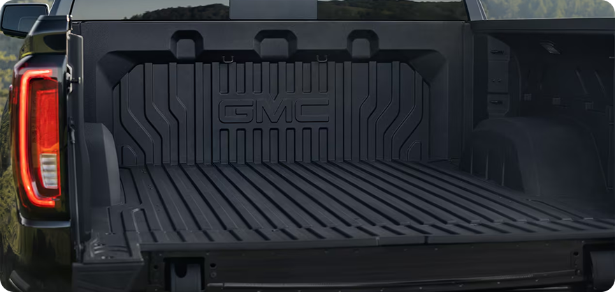 CarbonPro composite bed of a GMC Sierra 1500 with GMC lettering molded into the front wall
