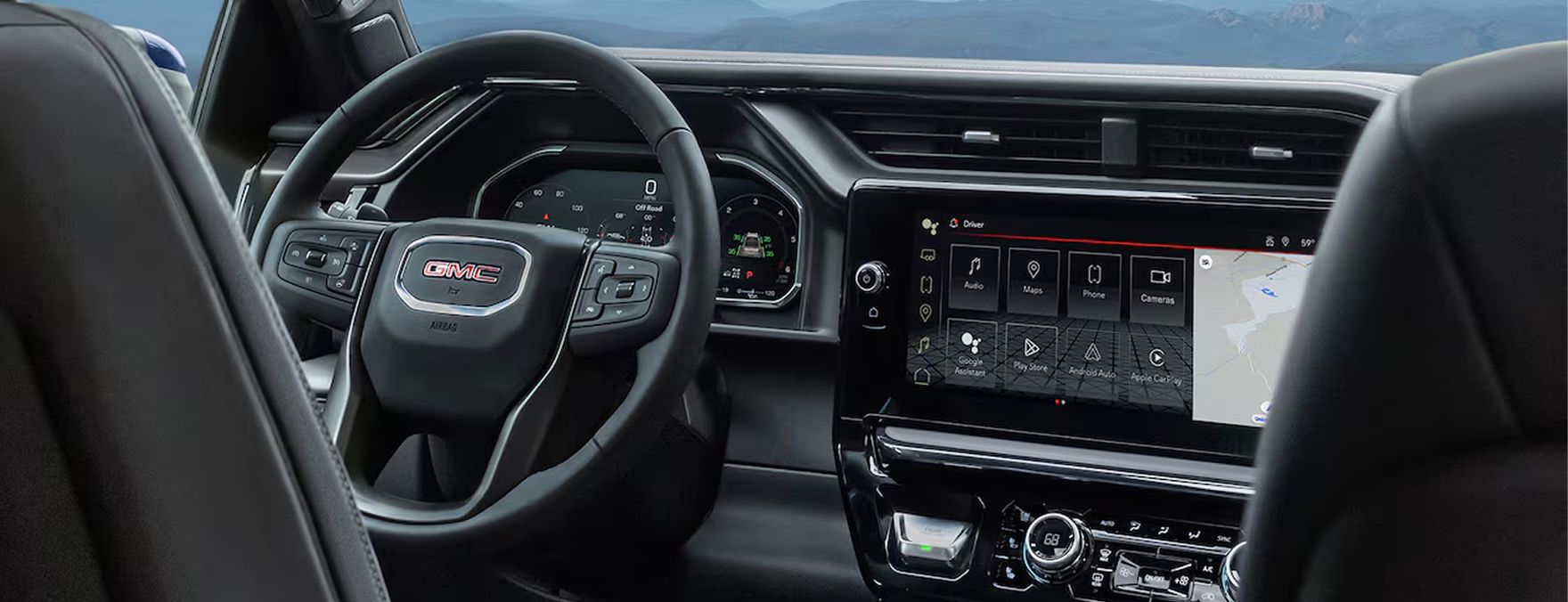 GMC Sierra 1500 steering wheel, digital driver display and wide center touchscreen