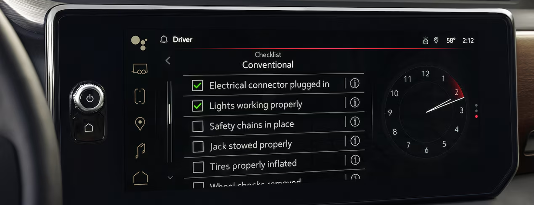 GMC Sierra 1500 touchscreen showing a trailering checklist beside an analog clock