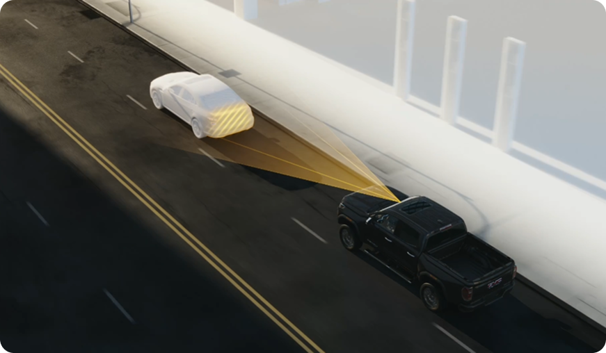 Illustration of a black GMC truck following a car, with amber sensor beams measuring the distance ahead