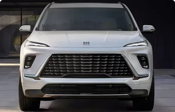 Front view of a white Buick Enclave Avenir showing its exclusive mesh grille