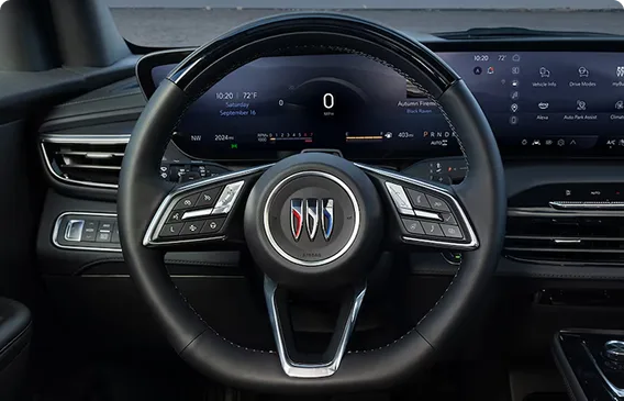 Enclave Sport Touring flat-bottom steering wheel in front of the driver display