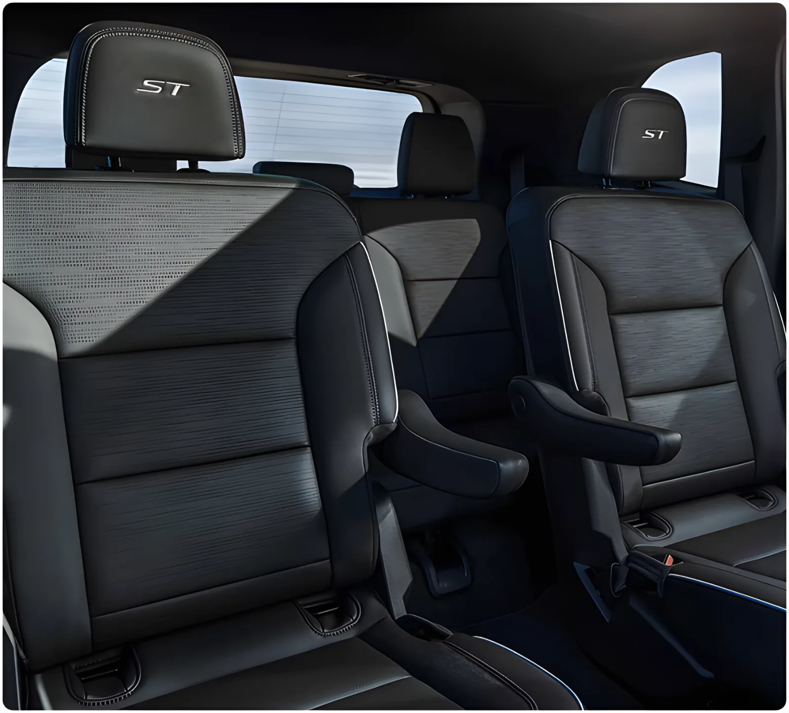 Second-row captain's chairs with ST headrests inside the Enclave Sport Touring