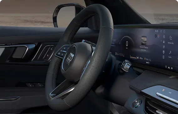 Enclave Preferred heated steering wheel in front of the driver display