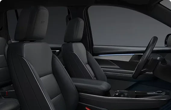 Perforated black leather front seats inside the Enclave Sport Touring