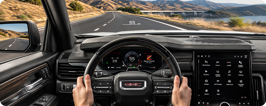Driver’s view in a GMC Acadia with the Head-Up Display projecting 55 mph onto the windshield