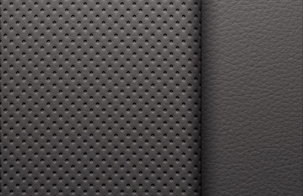 Close-up of dark perforated seat upholstery in the Yukon Elevation
