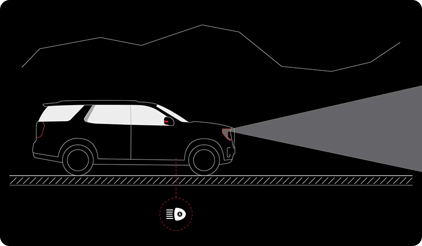 Illustration of a Yukon projecting its high-beam headlamp pattern down the road