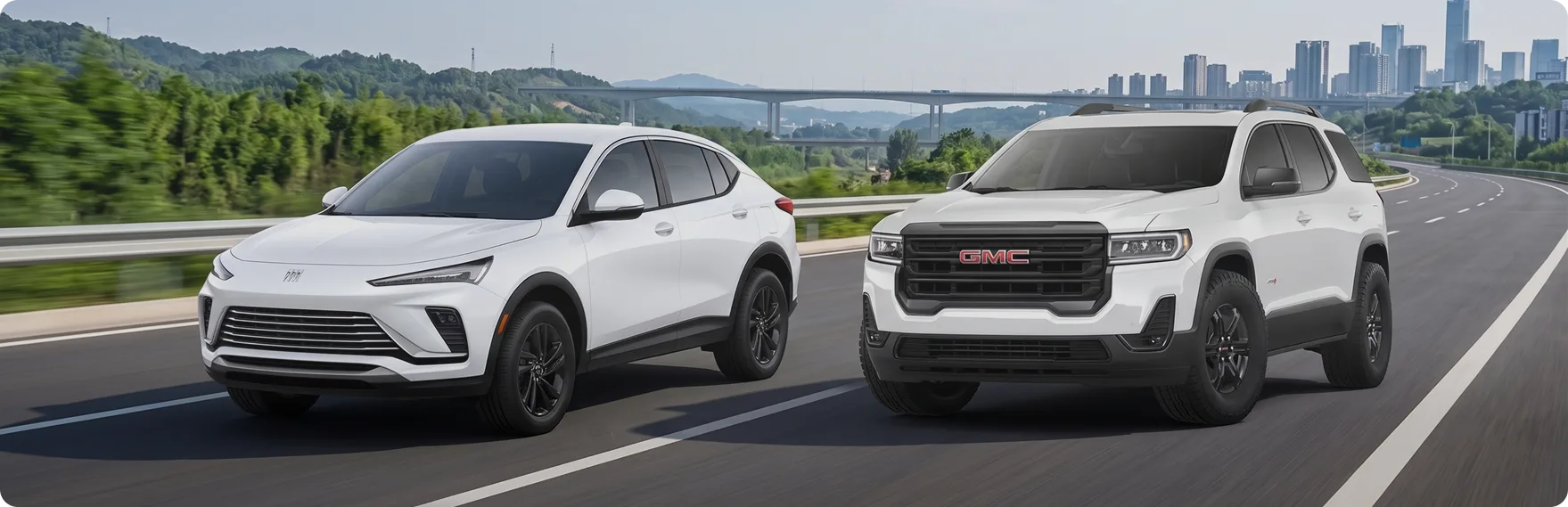 A white Buick crossover and a white GMC SUV driving a highway with a city skyline behind them